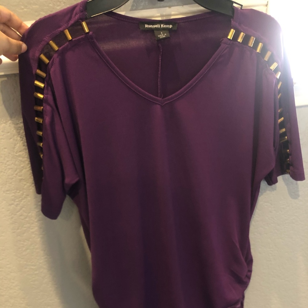 Russell Kemp purple shirt